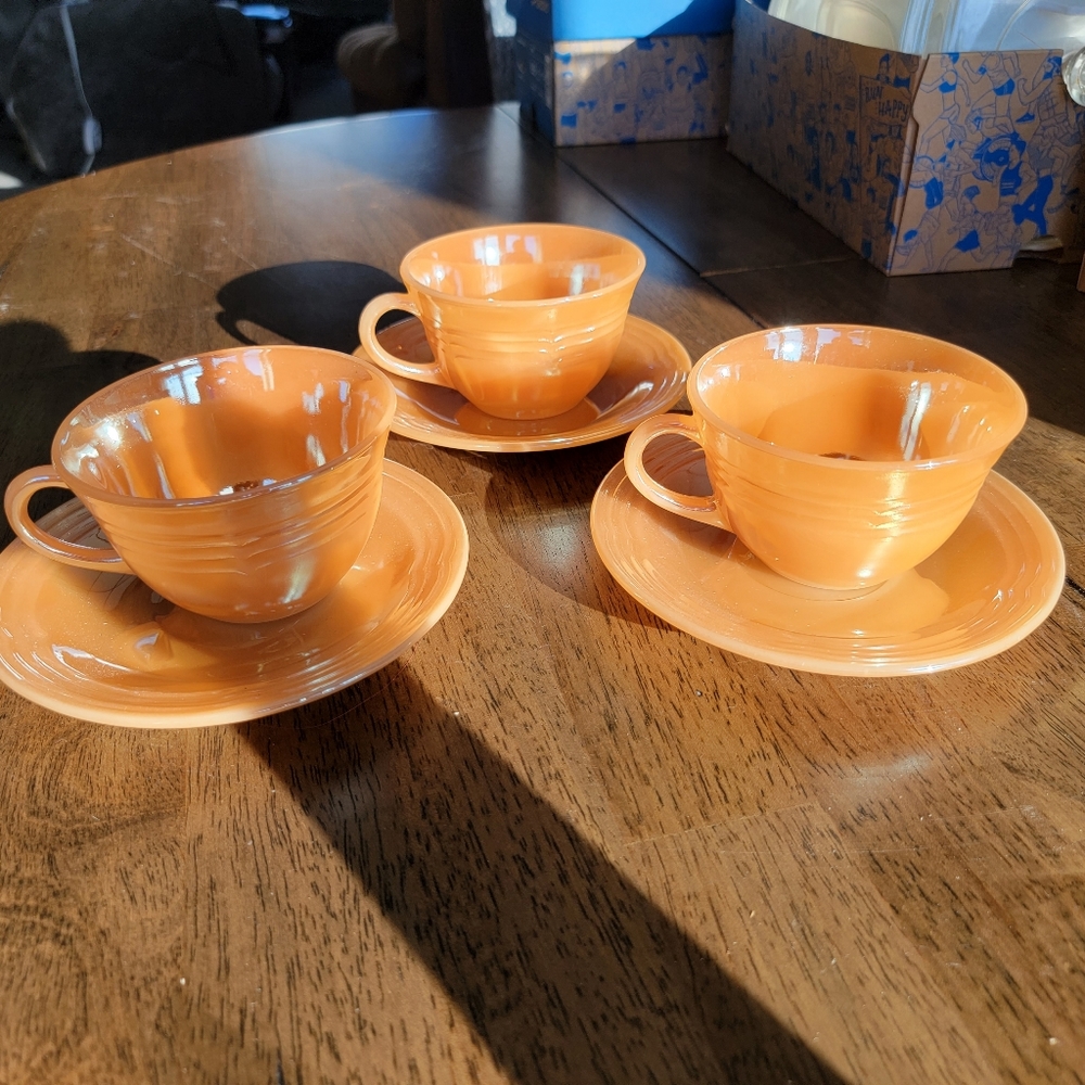 Collectable Peach Fire King cups & saucers